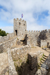 Fototapeta na wymiar Old ruins of medieval hilltop castle Castelo dos Mouros (The Castle of the Moors) in Sintra, Portugal.