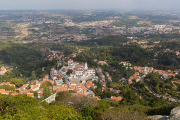 Fototapeta na wymiar View of Sintra's historical old town and beyond from above in Portugal.