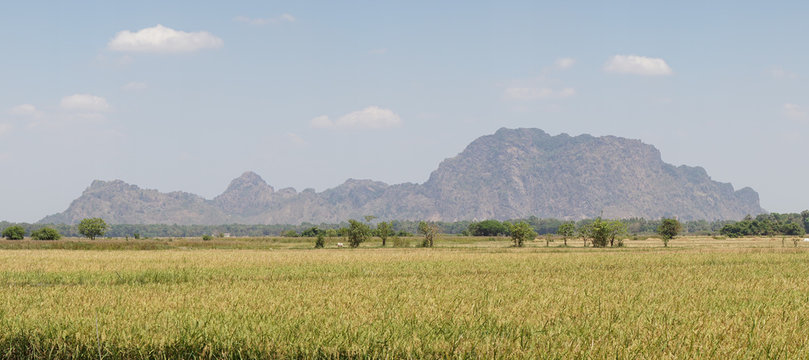 Moutain and grass landscape near the Mahar Sadan Cave in Hpa-An, Myanmar / Burma.