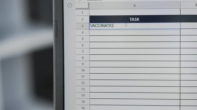 Person marking task VACCINATION in online plan, to-do list