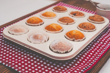 12 sweet baked muffins in a mold
