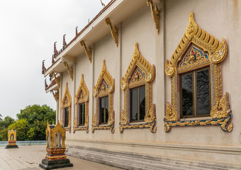 Ko Samui Island, Thailand - March 18, 2019: Wat Khunatam Buddhist Temple and monastery. Windows set...