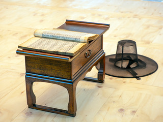old wooden table and old book