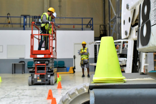 Paterna, Valencia, Spain: 10.18.2019; The yellow traffic cone in the workshop