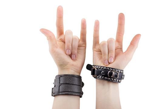 Hand With Leather Rocker Bracelet With Rock And Roll Sign, Rock Music Isolated On White Background