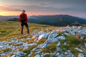 The mountaineer standing on the top of the Alancic mountin in the Velebit mountain range...