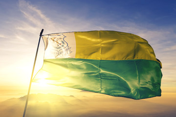 Paco do Lumiar of Brazil flag waving on the top sunrise mist fog