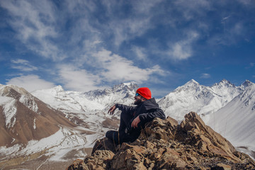 Man meditating at mountains Travel Lifestyle relaxation emotional concept adventure vacations outdoor harmony with nature