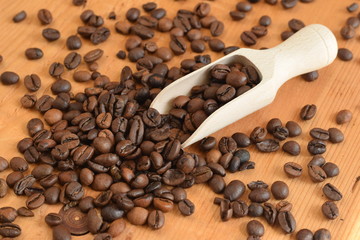 Coffee beans on wooden board