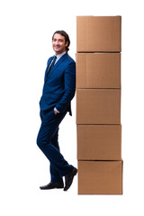 Young male employee with boxes isolated on white