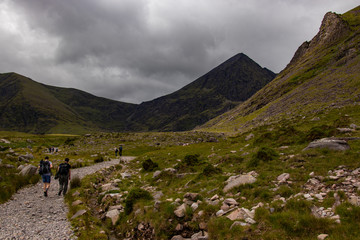 Fototapeta na wymiar Nearby Carrantuohill Mountain, way to the pick, river and road, Co. Kerry, Ireland summer