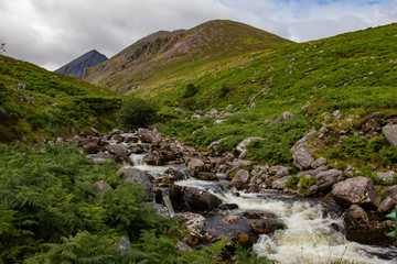Nearby Carrantuohill Mountain, way to the pick, river and road, Co. Kerry, Ireland summer