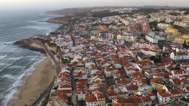 Ericeira village beach and cityscape in Portugal, Europe, 4k aerial drone view