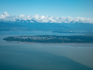 Aerial view of International Airport of Vancouver (VVR) and downtown	
