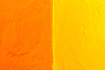 Abstract background of variable geometry and intense yellow and blue colors.