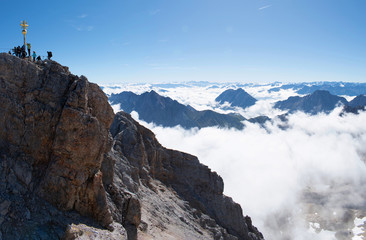People who have succeed in climbing the mountain, and have reached the top.