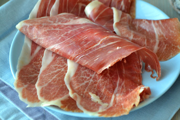 Variety of Raw Black Angus Prime meat slices.