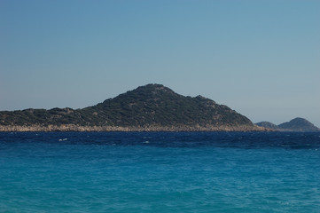 Fototapeta na wymiar A distant island seen from the Kaputaş Beach, Turkey