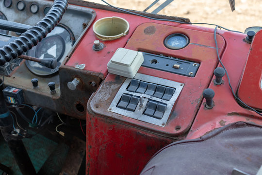 Steering Wheel And A Dashboard Of An Old School Bus, Public Passenger Bus Interior