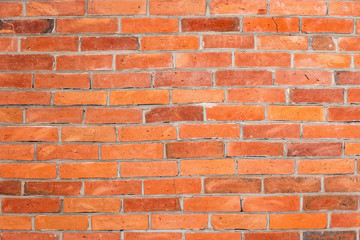 Obraz premium Red brick wall background inside of the room.