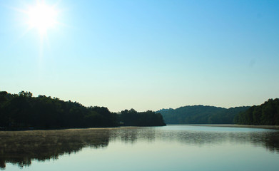 Early morning fog burns off a lake in Western PA