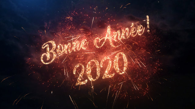 2020 Happy New Year greeting text in French with particles and sparks on black night sky with colored fireworks on background, beautiful typography magic design.