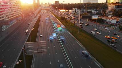 Beautiful aerial view to autonomous cars self-driving on the highway in Moscow. Picturesque aerial...