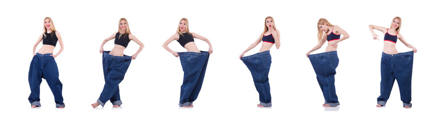 Woman in dieting concept with big jeans