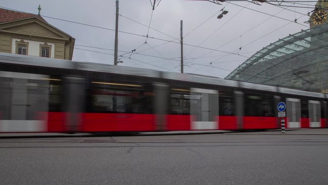 Timelapse. City traffic panorama. View towards central railroad station. Bahnhofplatz. Bern. Switzerland. Europe.