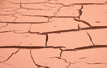 Old cracked colourfull paint textured background.City life and neighbourhood.Old pained window.Dried Out colored paint.