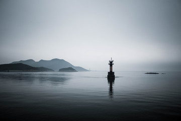 a solitary buoy in the seas of Jeju Island, South Korea © 원묵 강