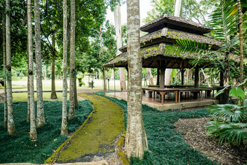 an open wooden house in a park in Bangkok, Thailand