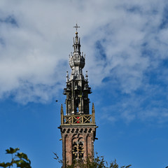Obraz premium Edam Town Clock Tower Against Cloudy Blue Sky Netherlands