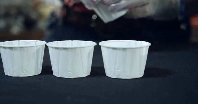 Drink Samples For Customers At Grocery Store In Small Paper Cup