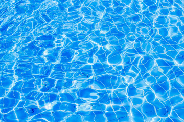 Surface of blue water wave in swimming pool, Pool water background.