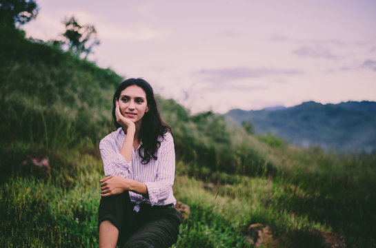 Beautiful woman relaxing and sitthing at outdoor,Positive thinking,Vacation concept