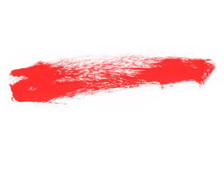 Brush with red paint on white background