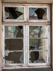 A broken window in the administration office
