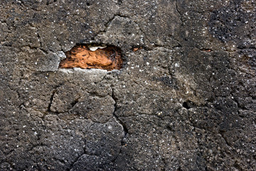 Old Cement Wall and damaged brick