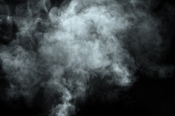 Abstract  powder or smoke isolated on black background