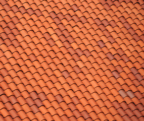 close up on red shingle on the roof