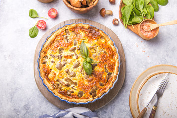 Homemade quiche lorraine with chiken, mushrooms, cheese. top view. Cooking. Spices, butter.  Tart.