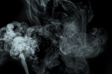 Abstract  powder or smoke isolated on black background