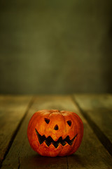 Jack O'Lantern for Halloween on wooden