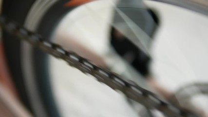 Close up shot of bicycle chain while riding