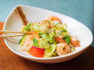 tasty salad with shrimps and vegetables