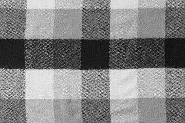 Black and white checkered plaid fabric texture for background. tartan texture