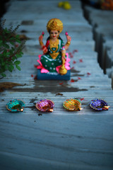 Idol of Mahalakshmi, Diya and Tulsi on the auspicious occasion of Deepawali