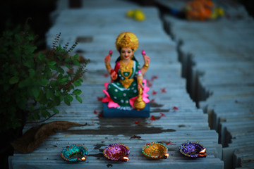 Idol of Mahalakshmi, Diya and Tulsi on the auspicious occasion of Deepawali