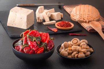 Fermented foods red hot peppers, mushrooms and tofu bean curd - traditional Korean food